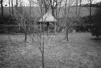 The Celtic Totem sculpture in its pergola at Salena Stamps